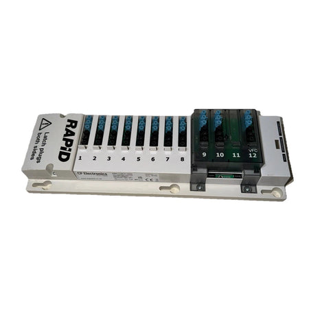 A CP Electronics RAPID industrial PLC input/output module with 12 digital inputs and 2 analog inputs, featuring a white metal housing, black terminal blocks, and green terminal covers on a white background.