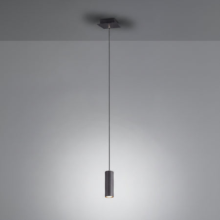 Modern pendant light fixture hanging against a plain background