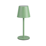 A Pistachio green table lamp with a conical shade on a cylindrical base, displayed against a white background.