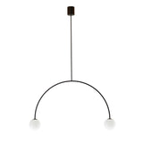Modern pendant light with black arch and white spherical shades on a white background